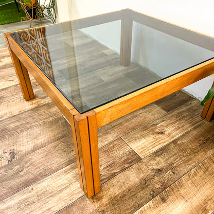 Large square wooden coffee table with Smokey glass top