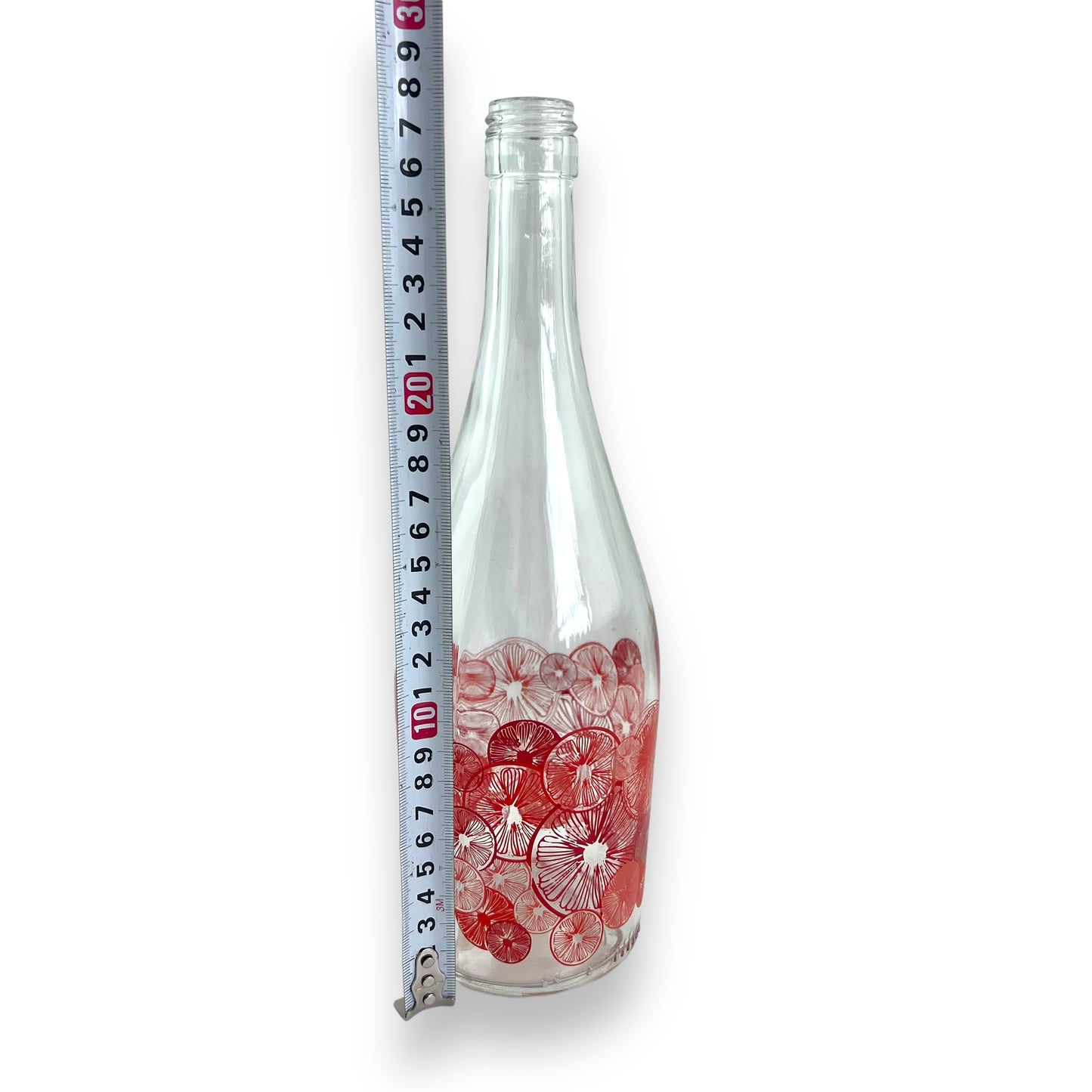 Red citrus pattern glass bottle