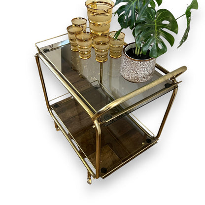 Brass two tier bar dart trolley with Smokey glass shelves