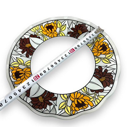 Ripple edge glass plate with yellow, brown and white flower pattern