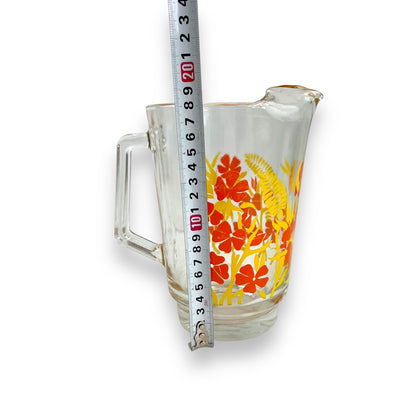 Orange & yellow flower clear glass jug