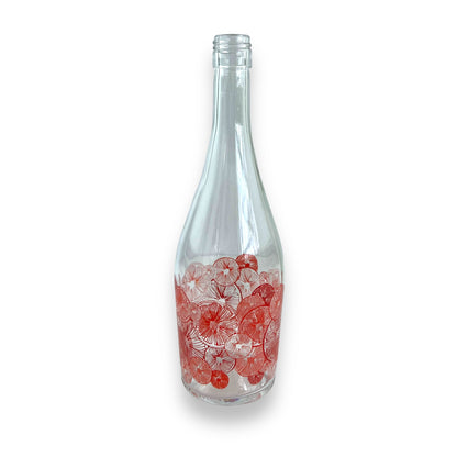 Red citrus pattern glass bottle