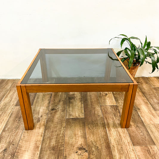 Large square wooden coffee table with Smokey glass top