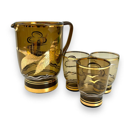 Smokey Black Glass Jug with gold flying birds and 3 glasses