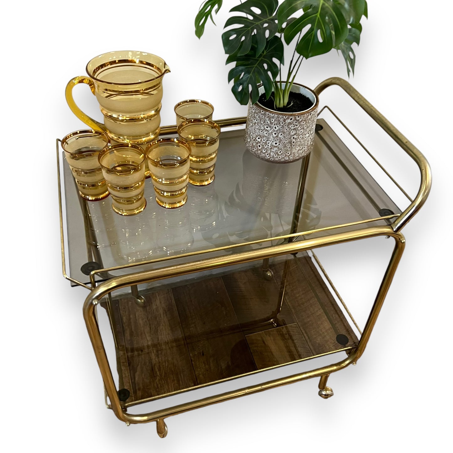 Brass two tier bar dart trolley with Smokey glass shelves