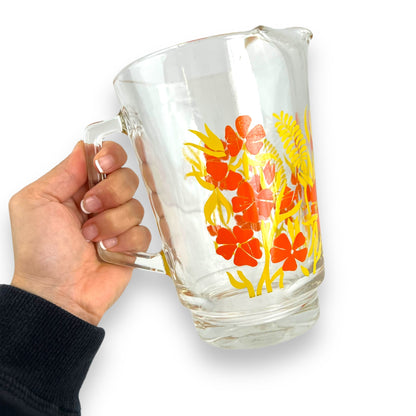 Orange & yellow flower clear glass jug